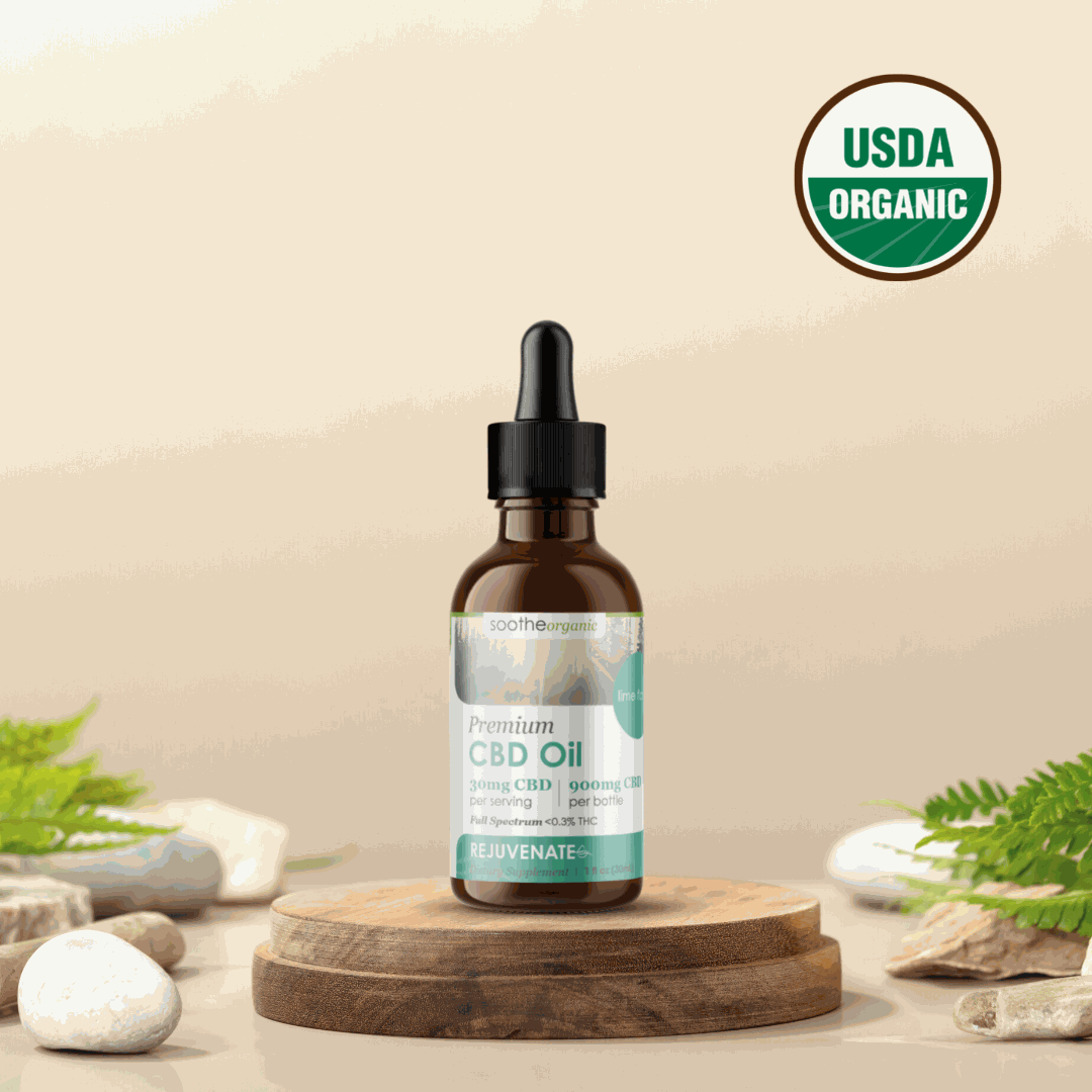 Lifestyle image of Soothe Organic tropical CBD tincture for stress relief on wooden table bottle