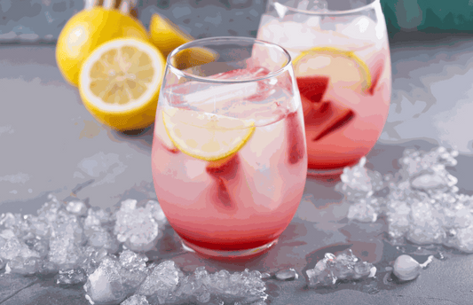 Berry Lemonade Sparkler CBD mocktail with fresh berries and lemon