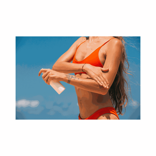 Woman applying organic CBD cream to her shoulder for natural joint and muscle pain relief