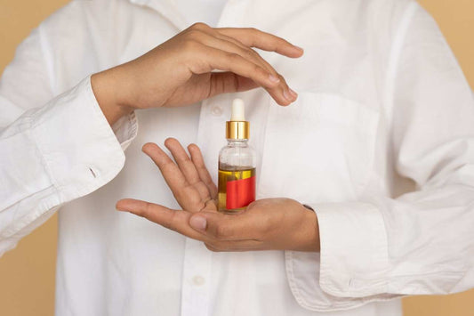  A woman sleeping peacefully on her side at dawn with a CPAP machine and a Soothe Organic full-spectrum CBD tincture on the nightstand